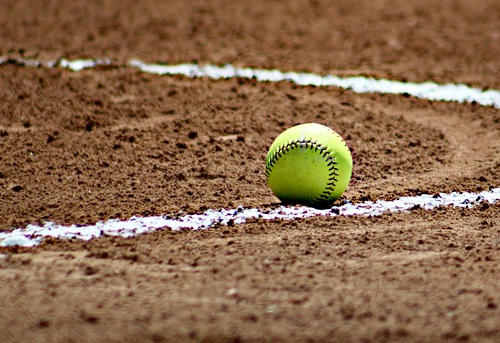 Softball on dirt field
