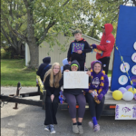 Students on Homecoming Float