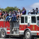 Football team on fire truck